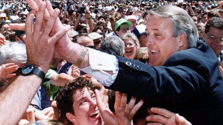Brian Mulroney served as Canada's 18th prime minister from 1984 to 1993. Here, Mulroney greets Canada Day crowds on Parliament Hill in Ottawa in 1991. (Frank Gunn/The Canadian Press)