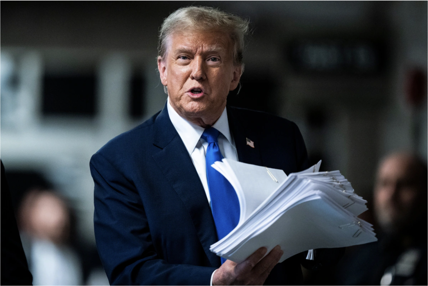 Former president Donald Trump talks to reporters after a day of jury selection at Manhattan criminal court. (Jabin Botsford/The Washington Post)