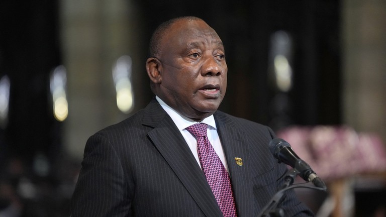 South African president passes disputed health law
