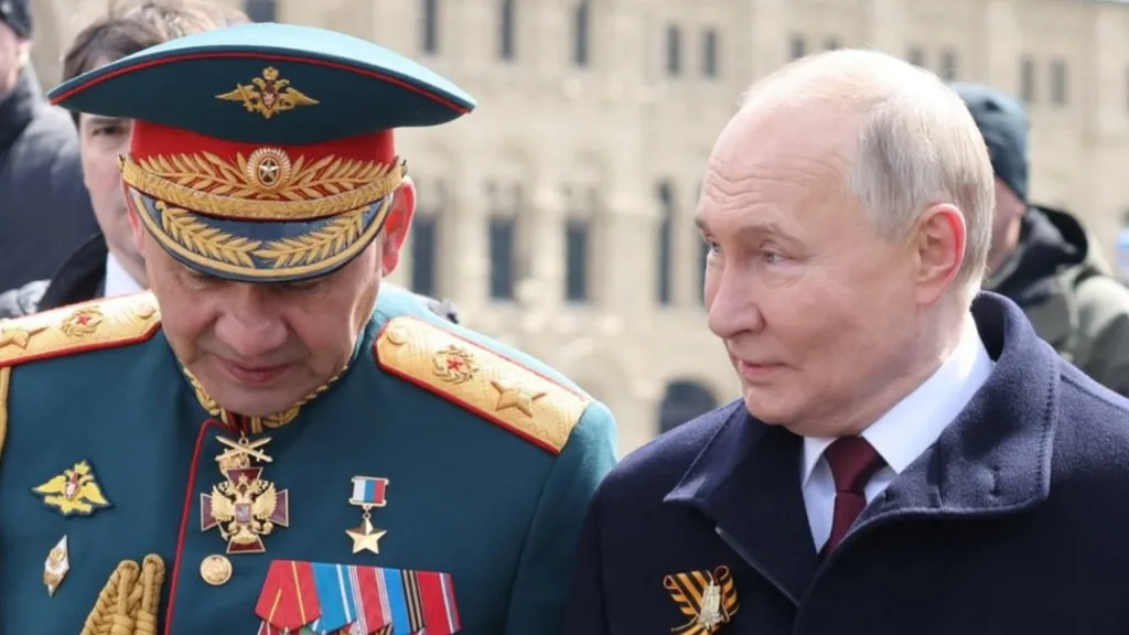 Sergei Shoigu (left) has long been a Putin loyalist. EPA