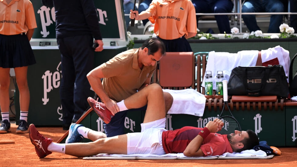 Novak Djokovic pulls out of French Open with knee injury