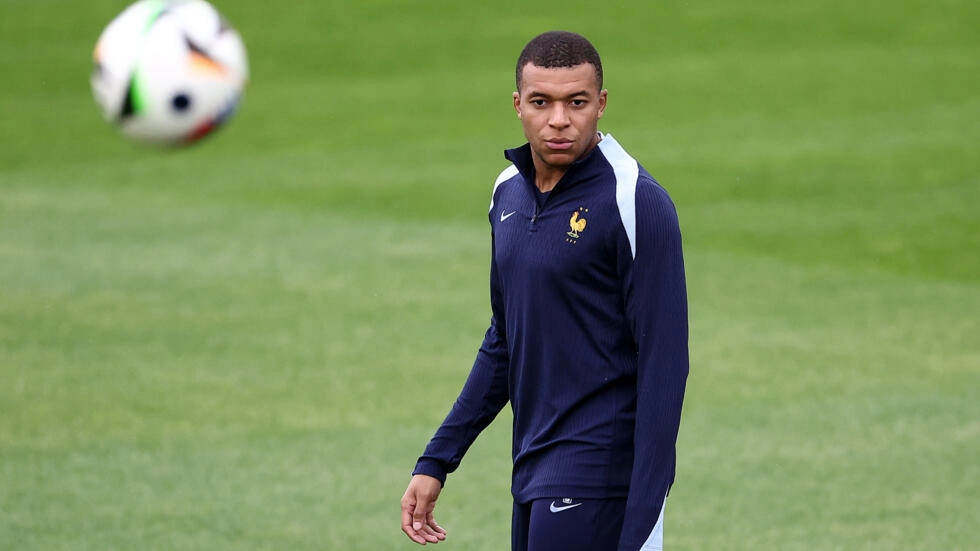 Football star Kylian Mbappé has called on French voters to speak up against political extremism ahead of the 2024 snap elections. © Franck Fife, AFP
