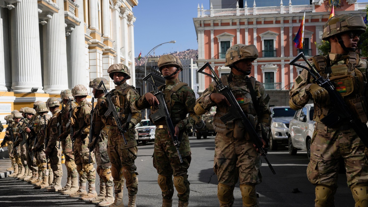 Soldiers block the street in front of the presidential palace, right, and the Legislative Assembly, left, in Plaza Murillo in La Paz, Bolivia, on June 26, 2024. Juan Karita/AP
