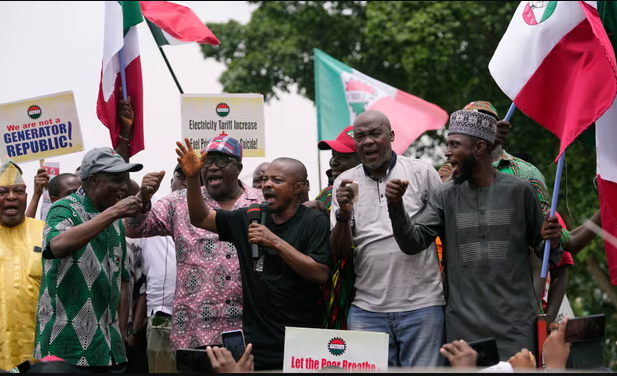 A union leader speaks in the capital, Abuja, at a protest against a recent increase in the electricity tariff. Photograph: Sunday Alamba/AP