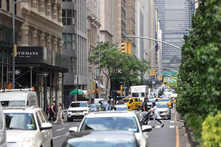 Cars drive on Park Avenue South in Manhattan on Wednesday. (Michael M. Santiago/Getty Images)
