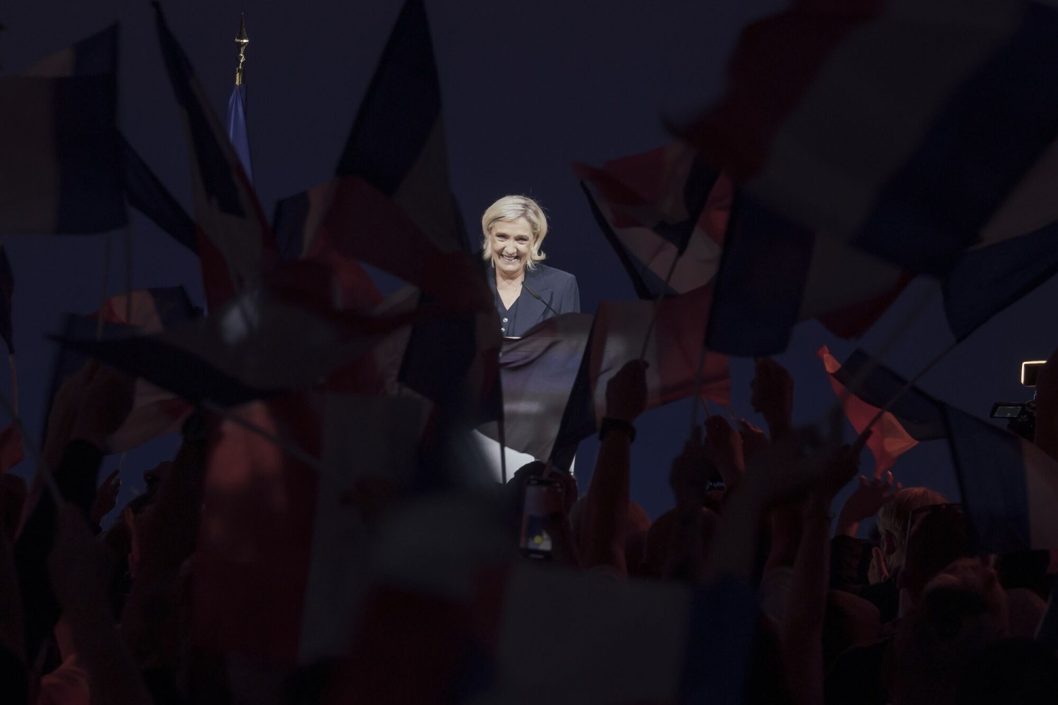 Marine Le Pen addresses supporters at the National Rally headquarters following the first round of legislative elections on June 30.Photographer: Cyril Marcilhacy/Bloomberg