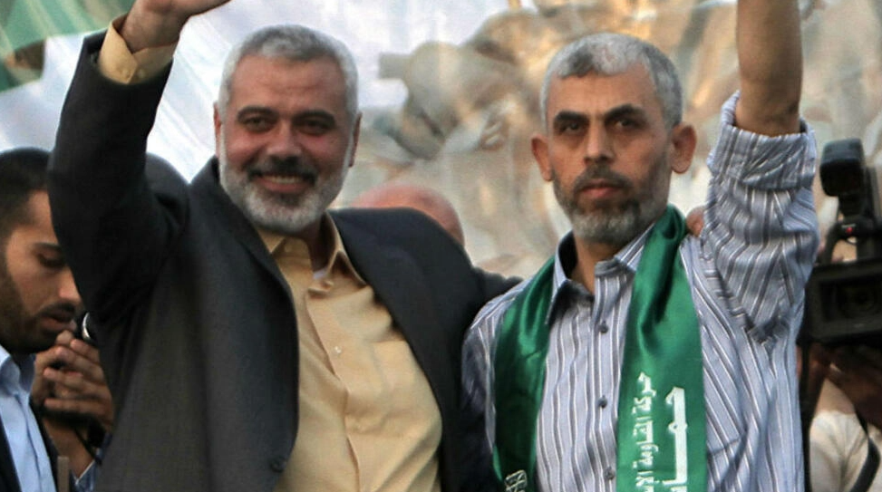 File photo: Hamas political leader Ismail Haniyeh (L) and Gaza leader Yahya Sinwar shown in the Palestinian coastal territory in October 2011. © Said Khatib, AFP