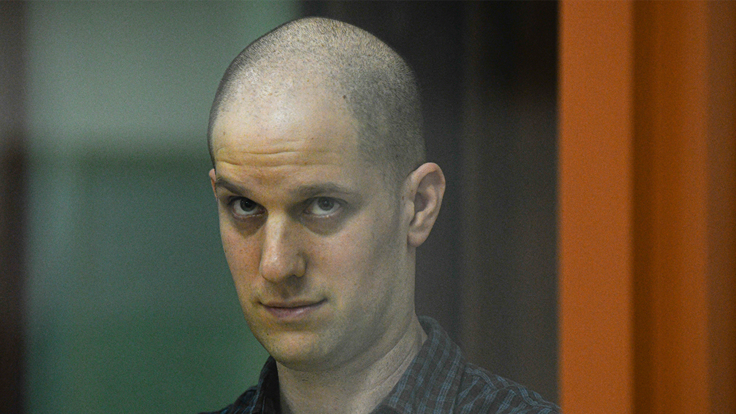 Wall Street Journal reporter Evan Gershkovich stands in a glass cage in a courtroom in Yekaterinburg, Russia, Wednesday, June 26, 2024. (AP)