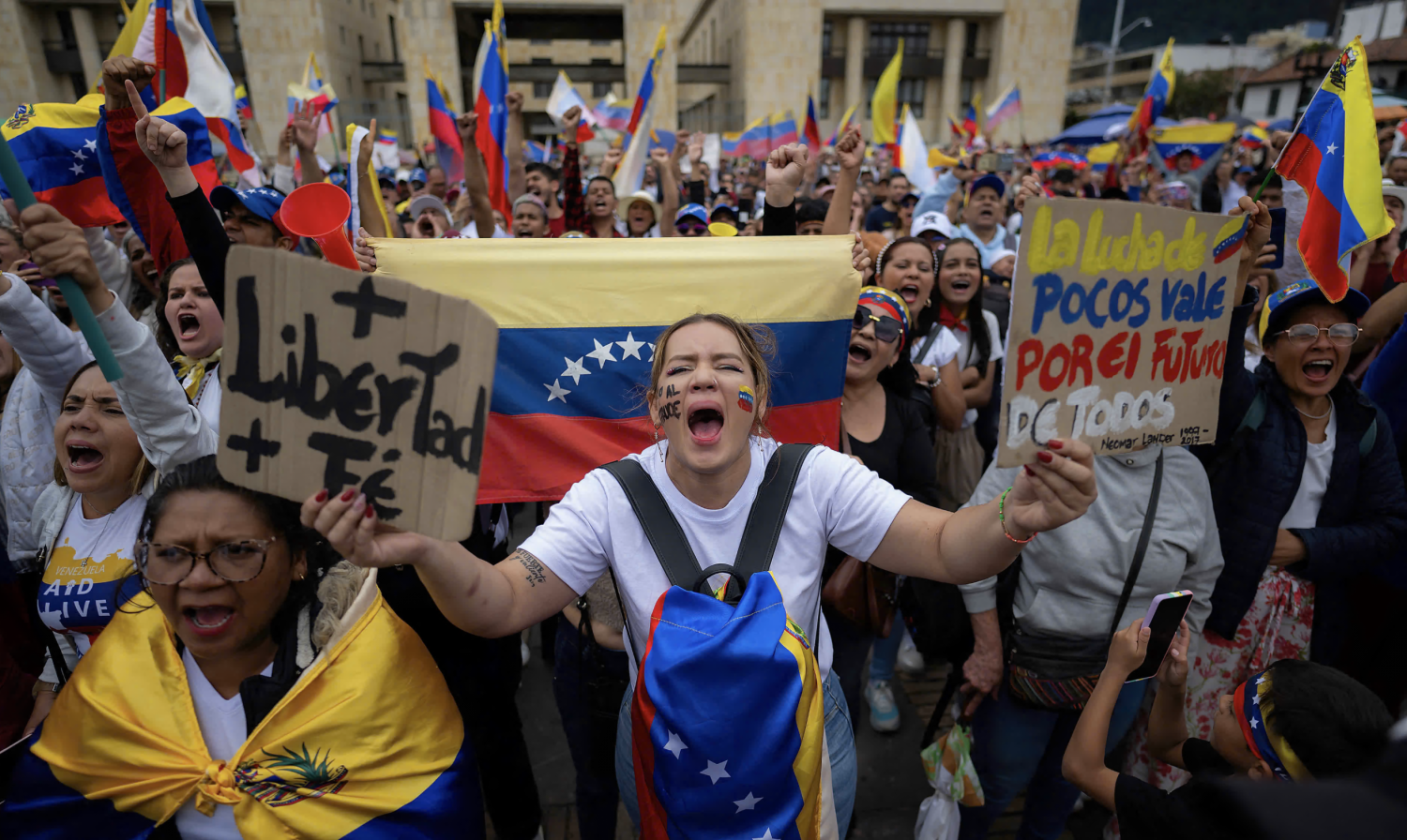 Demonstrators protest against Venezuelan President Nicolás Maduro's disputed victory in Bogota. Maduro has vowed to ‘pulverise’ challenge to his rule. Photograph: Luis Acosta/AFP/Getty Images