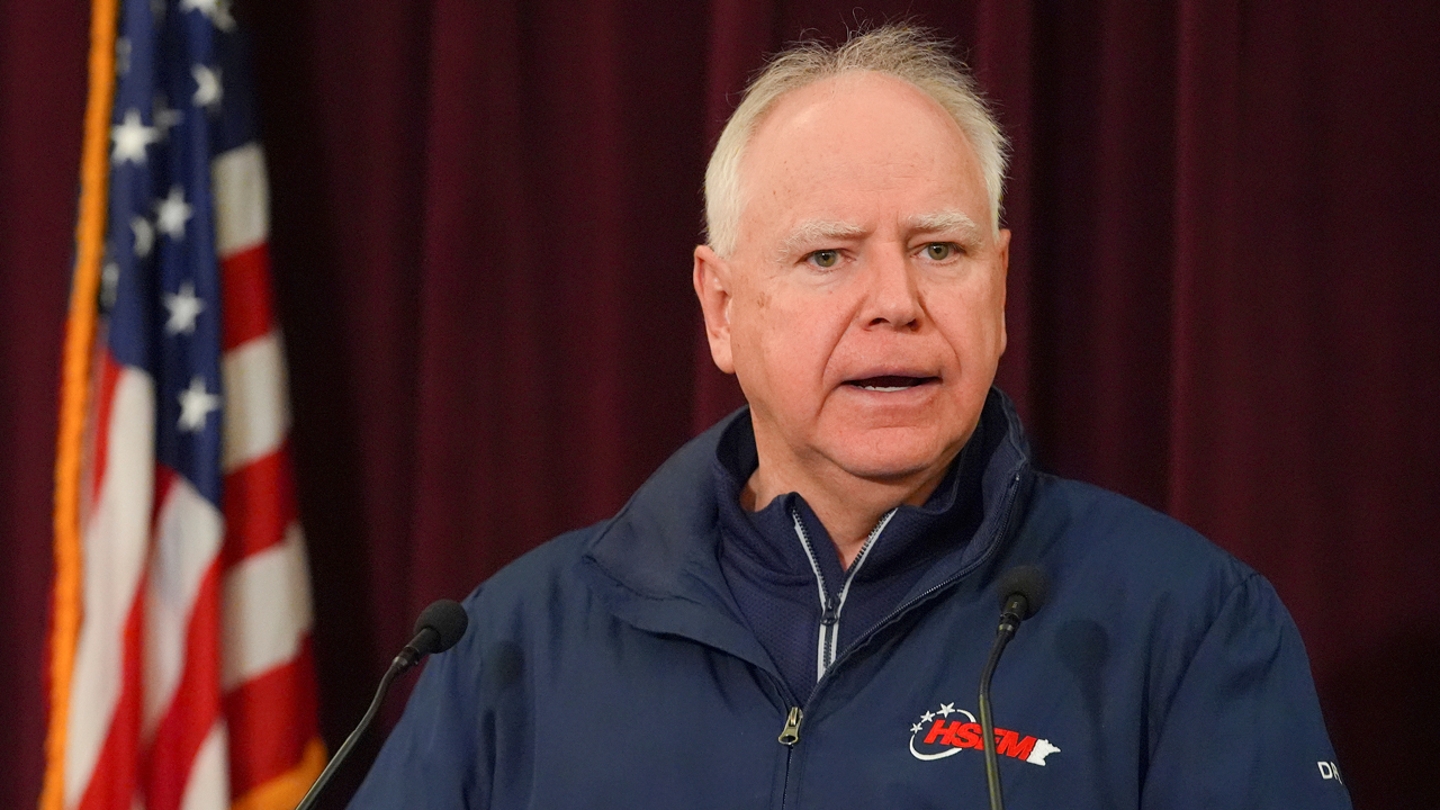 Minnesota Gov. Tim Walz speaks at a press conference after two police officers and a first responder were shot and killed on Sunday, Feb. 18, 2024, in Burnsville, Minn.