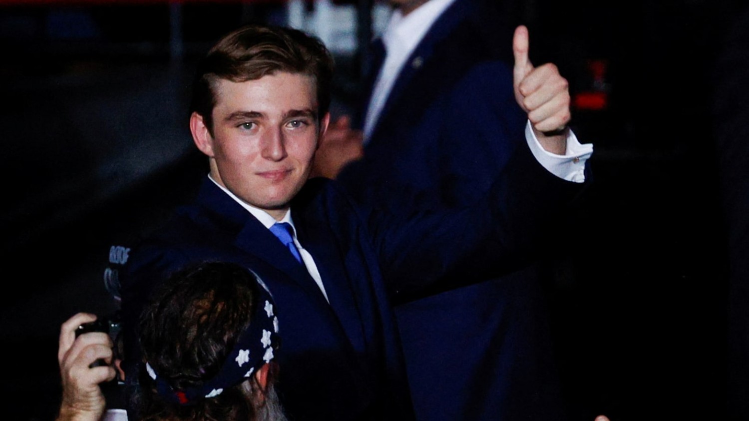 Barron Trump fist pumps / Marco Bello/Reuters