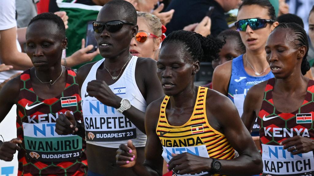 Uganda's Rebecca Cheptegei (second from right) competing in the women's marathon final in Budapest in August. (Photo by Ferenc ISZA / AFP)