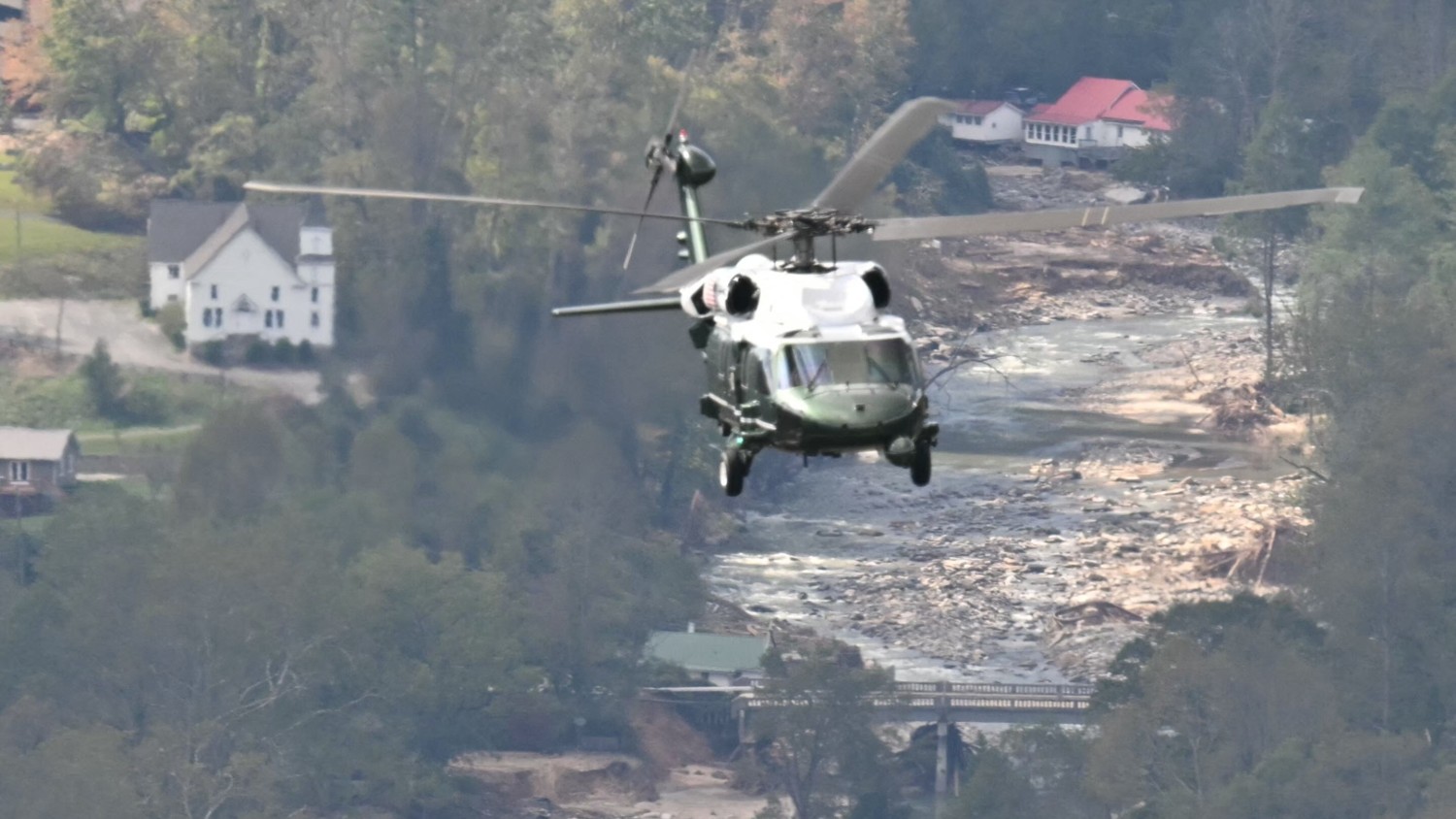 President Biden surveying the damage from Marine One AFPEL NGAN/AFP/GETTY IMAGES