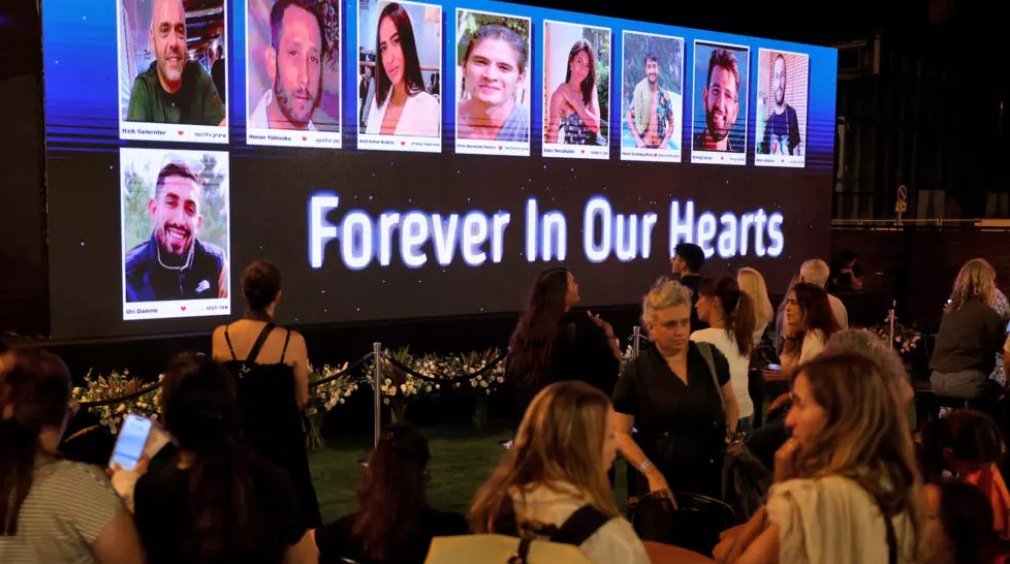 Thousands gather in Tel Aviv to mark anniversary of October 7 attack