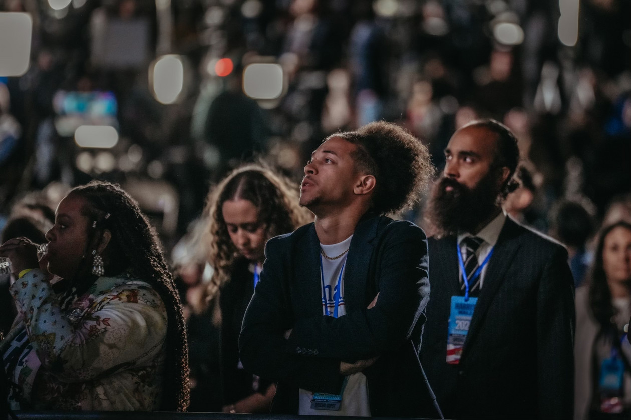 People watch election results come in at Vice President Kamala Harris’s election night event at Howard University in Washington, on Nov. 5, 2024. | Jamie Kelter Davis for POLITICO