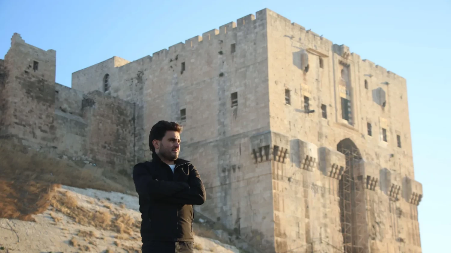 Abdulkafi Abdulkafi in front of the Aleppo Citadel, in the heart of the Syrian city