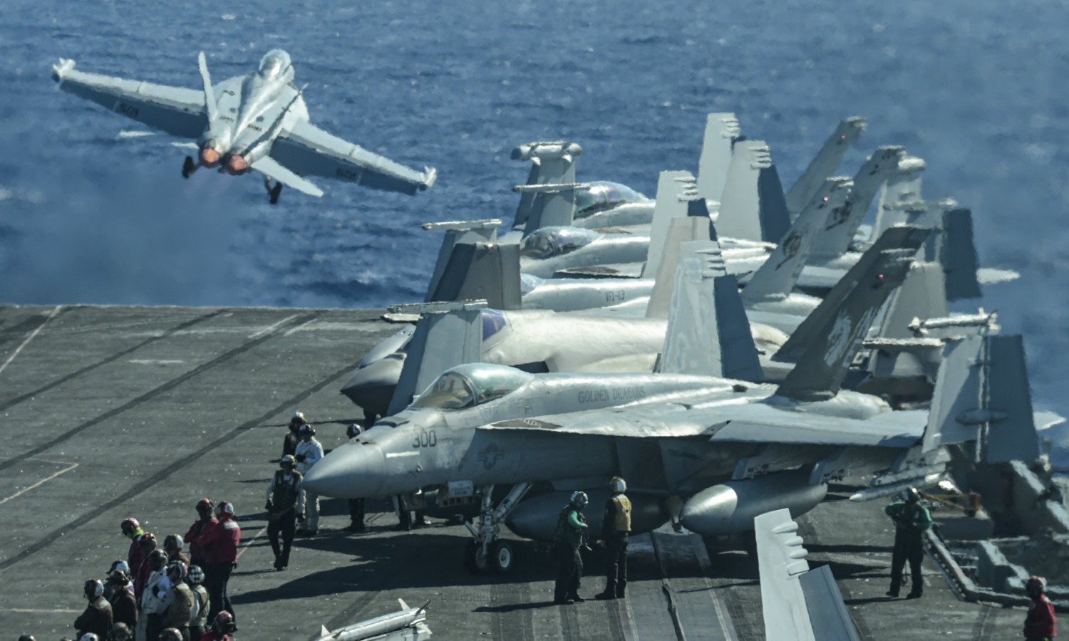 An F/A-18 fighter jet takes off from a US aircraft carrier earlier this year. The US military says two navy pilots were shot down by ‘friendly fire’ over the Red Sea on Sunday. Photograph: Richard A Brooks/AFP/Getty Images