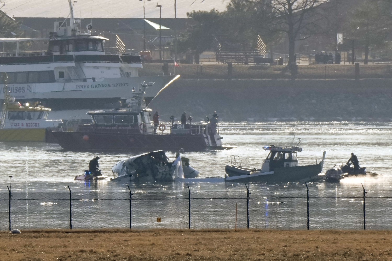 In pictures: Fatal collision between passenger jet and helicopter near Washington, DC