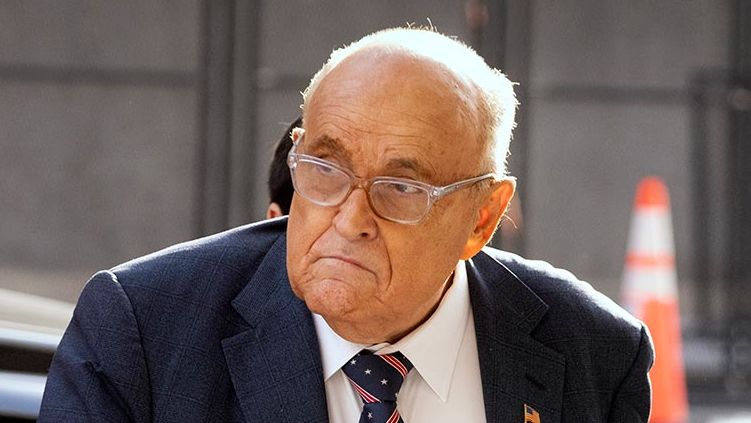 Judge says Giuliani’s behavior is ‘outrageous and shameful’ and finds him in contempt