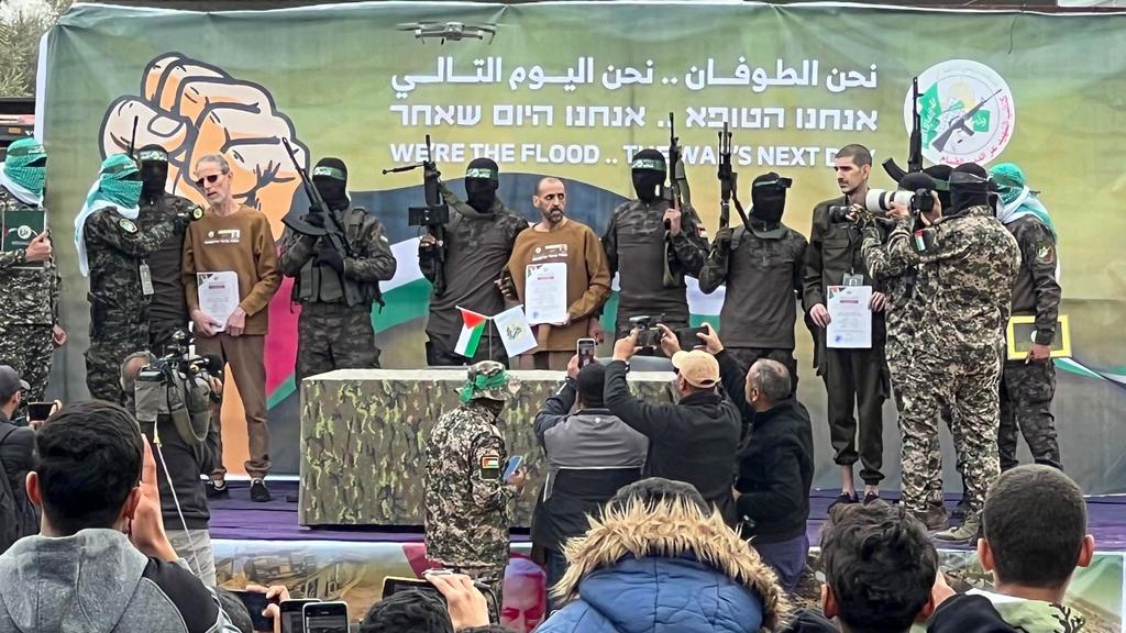 Israeli hostages released in bizarre parade﻿