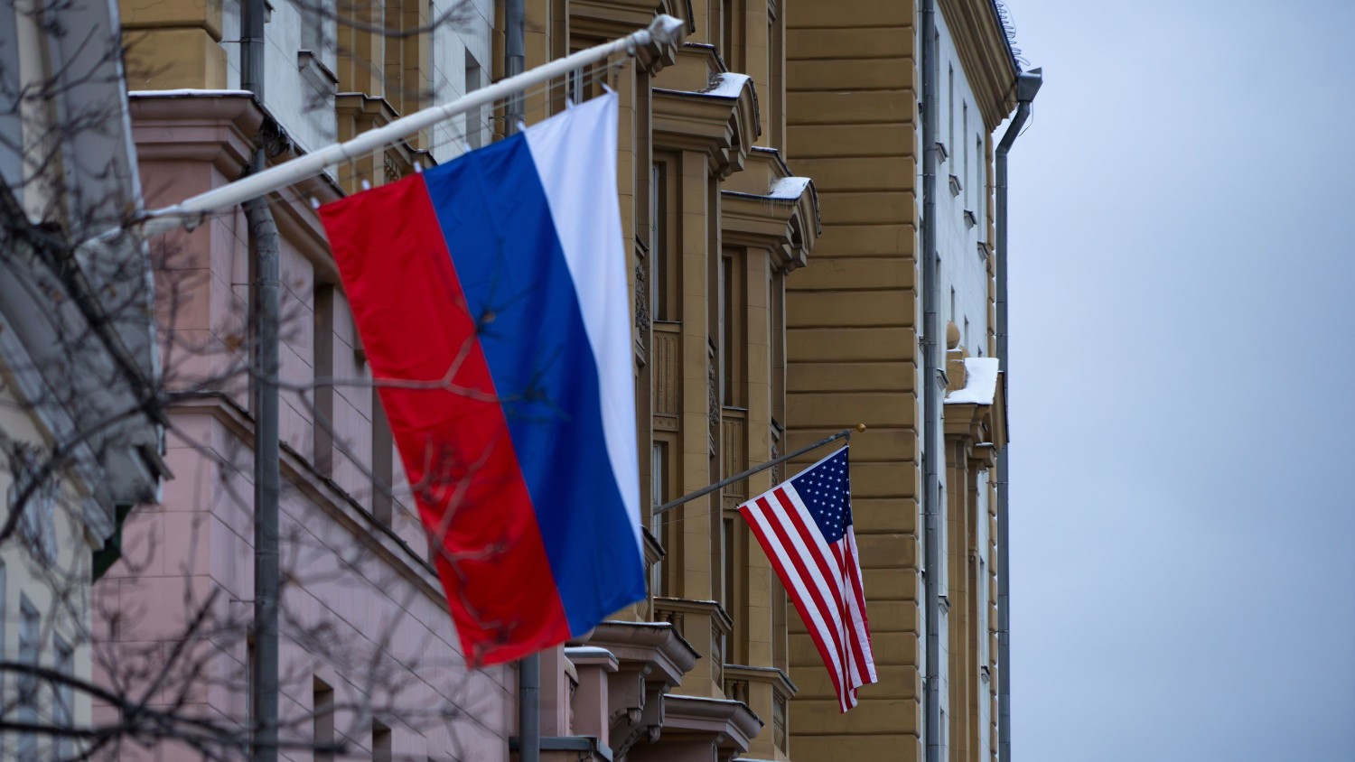 The US Embassy with a US national flag is seen behind a building with a Russian national flag in Moscow on November 5, 2024. Alexander Zemlianichenko/AP