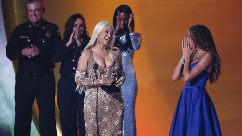 Beyonce receives Album of the Year award for Cowboy Carter during the 67th Annual Grammy Awards. (Mario Anzuoni/Reuters)