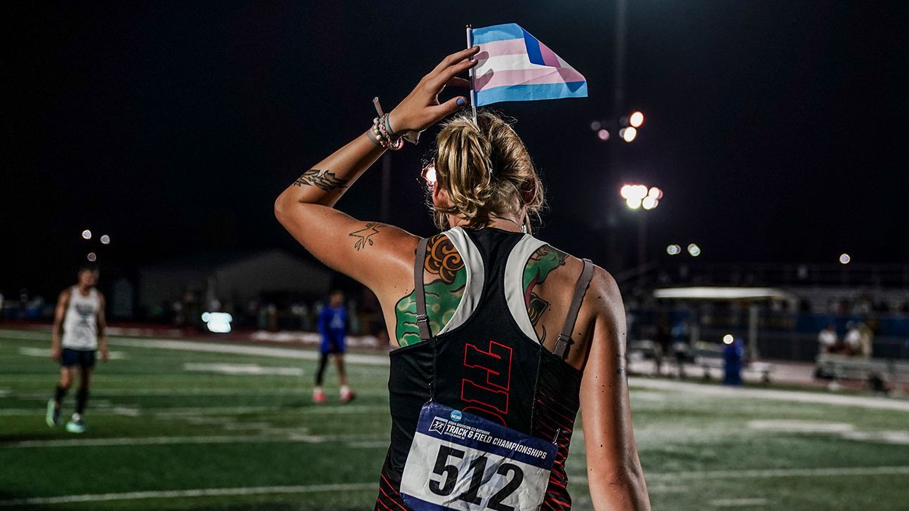 Sadie Schreiner puts a transgender flag in her hair before heading to the awards stand for the 200m race back in May 2024 when she was still allowed to compete in NCAA events. Jahi Chikwendiu/The Washington Post/Getty Images/File