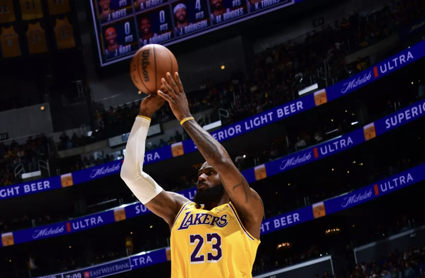 LeBron James shoots against the New York Knicks on Thursday in Los Angeles. (Adam Pantozzi / NBAE via Getty Images)