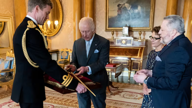 King Charles gives his Canadian attendant a sword as sovereignty threats intensify