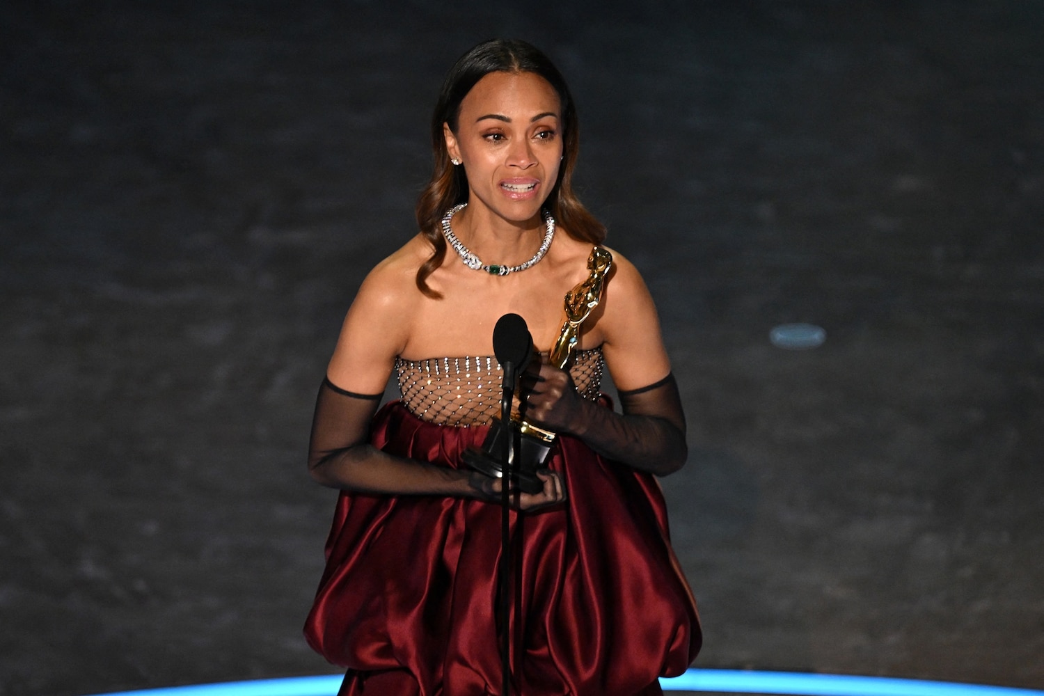 Zoe Saldana accepts the award for Best Actress in a Supporting Role for "Emilia Perez" onstage during the 97th Annual Academy Awards at the Dolby Theatre in Hollywood, Calif., on March 2, 2025. Patrick T. Fallon/AFP via Getty Images