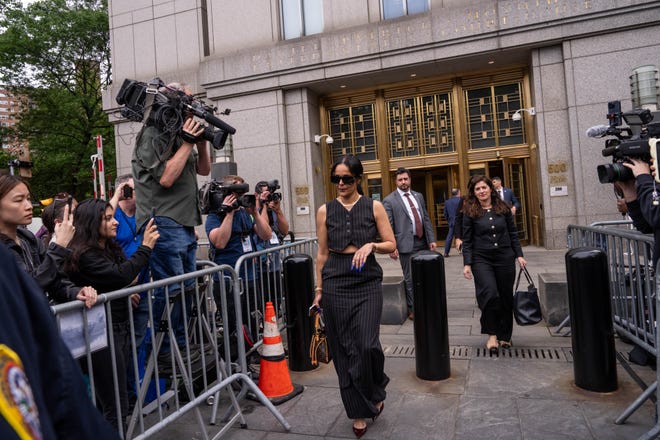 Diddy's ex-employee says music executive warned her 'to leave Puff alone'