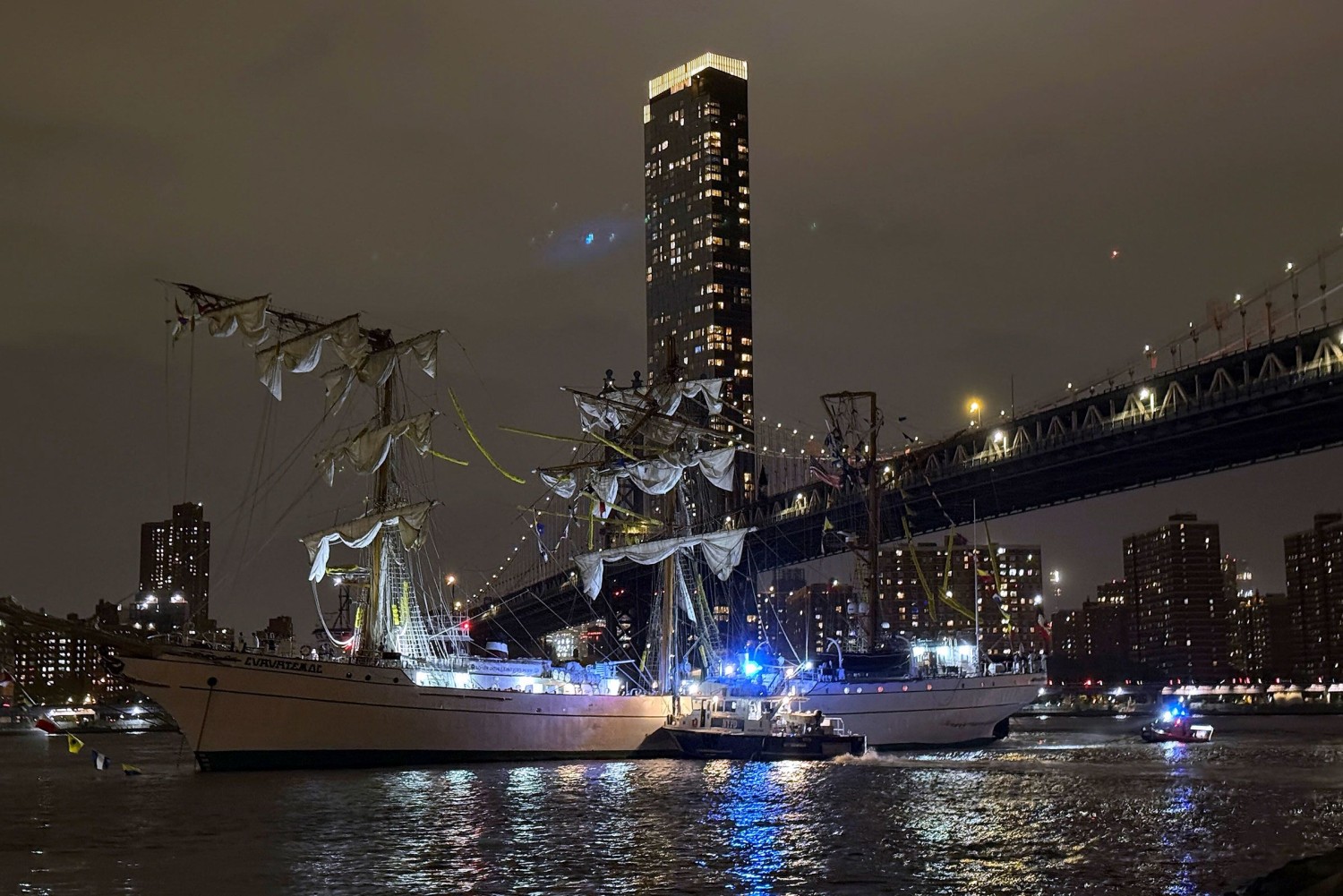 A masted Mexican Navy training ship, the Cuauhtémoc, sits after colliding with the Brooklyn Bridge in New York, on Saturday. Kyle Viterbo/AP