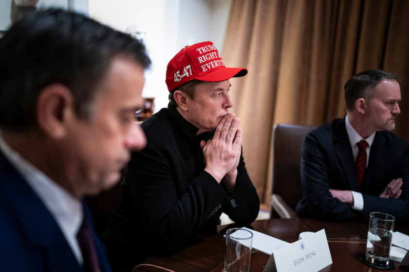 Elon Musk listens to President Donald Trump during a Cabinet meeting in March. (Jabin Botsford/The Washington Post)