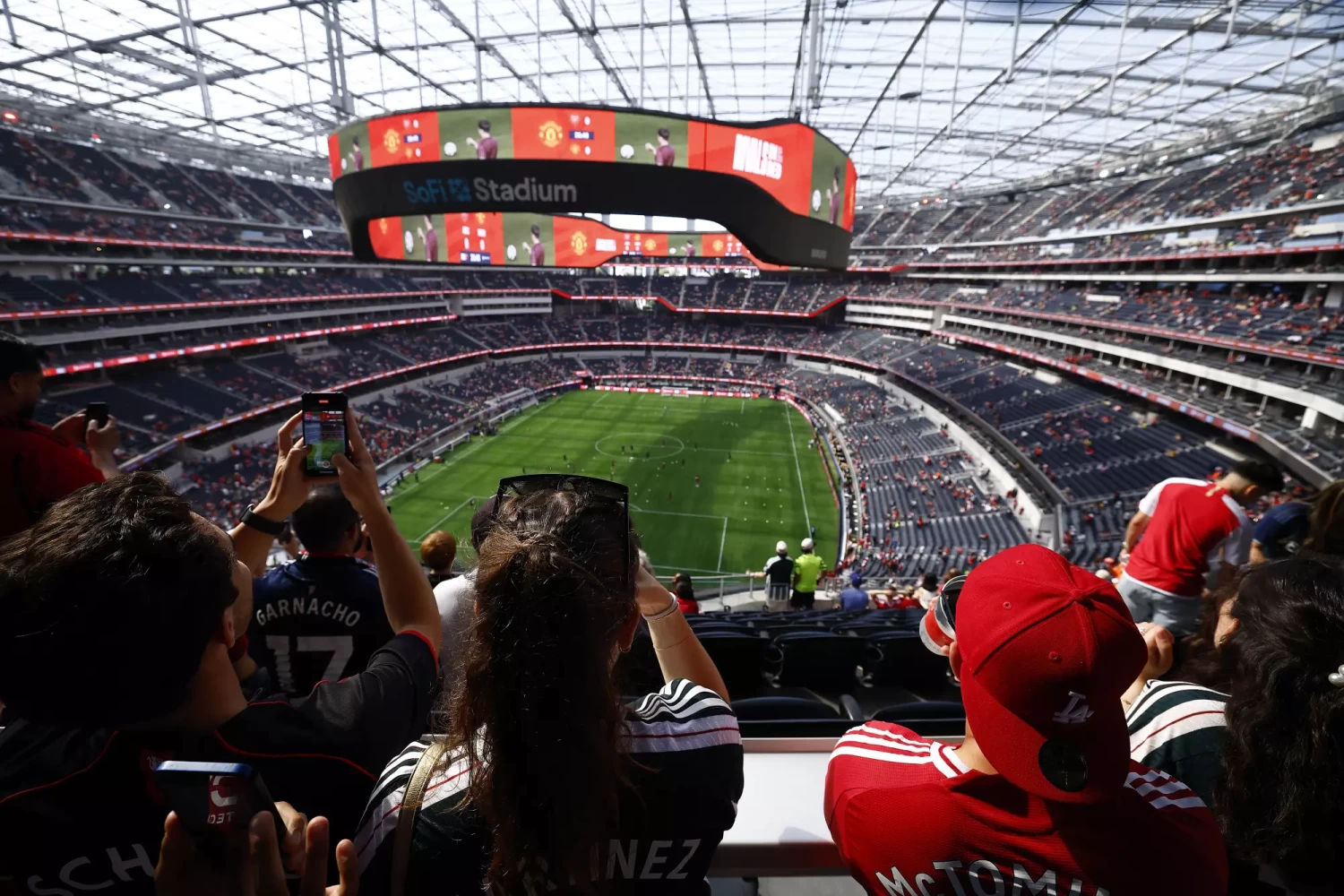 Soccer fans watch a friendly match between Manchester United and Arsenal at SoFi Stadium in July 2024. SoFi Stadium is scheduled to host eight matches during the 2026 FIFA World Cup.(Ronald Martinez / Getty Images)
