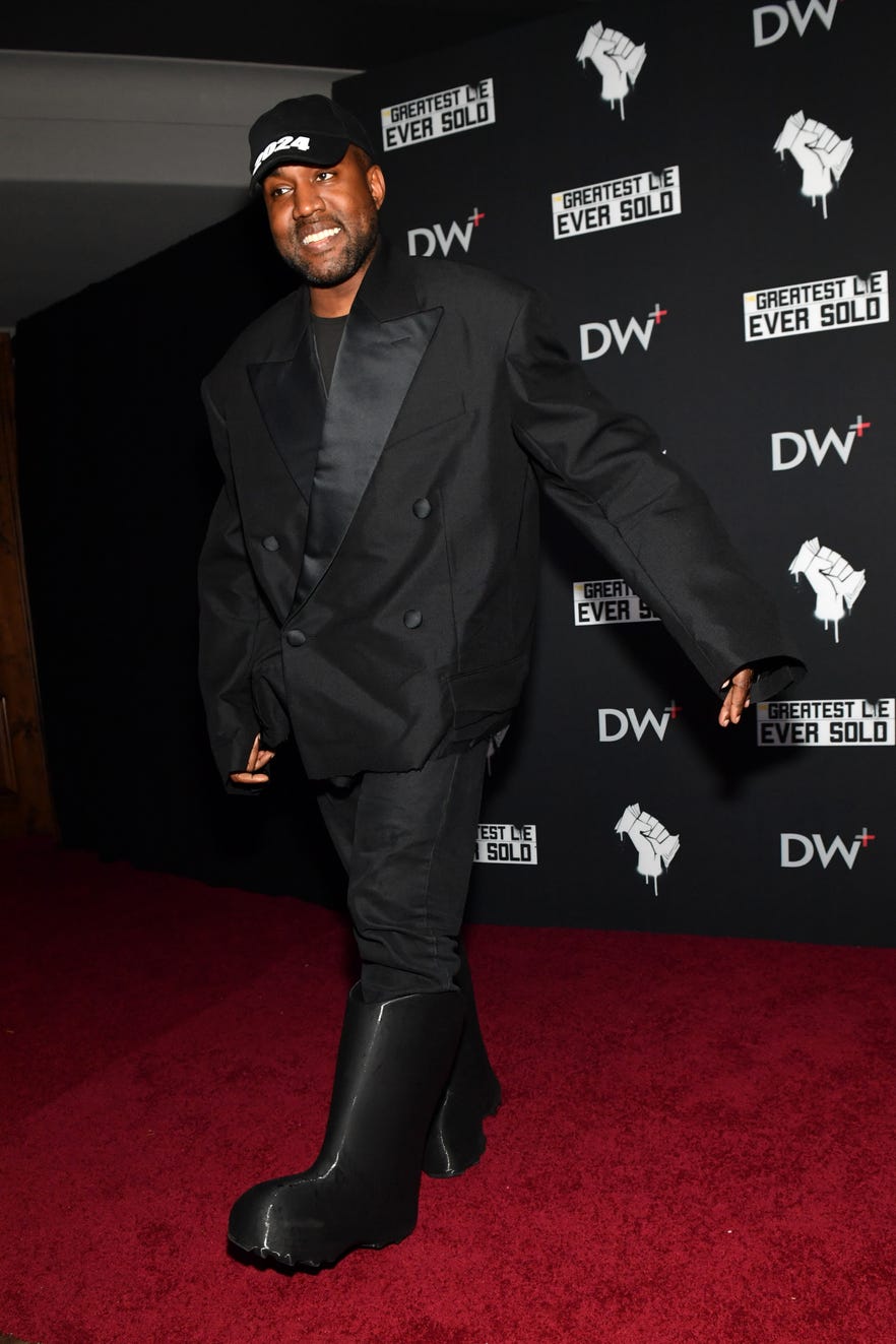 Rapper Ye shocks with Diddy trial courthouse appearance