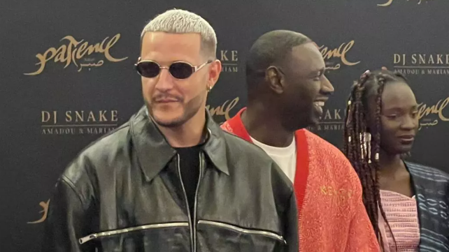 DJ Snake, Omar Sy et l'actrice sénégalaise Anna Thiandoum, lors de la première du court métrage "Patience", au Grand Rex, à Paris, mardi 3 juin. © David Rich