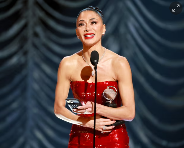 Nicole Scherzinger accepts the Tony award for best leading actress in a musical for her performance in Sunset Boulevard. Photograph: Theo Wargo/Getty Images for Tony Awards Productions