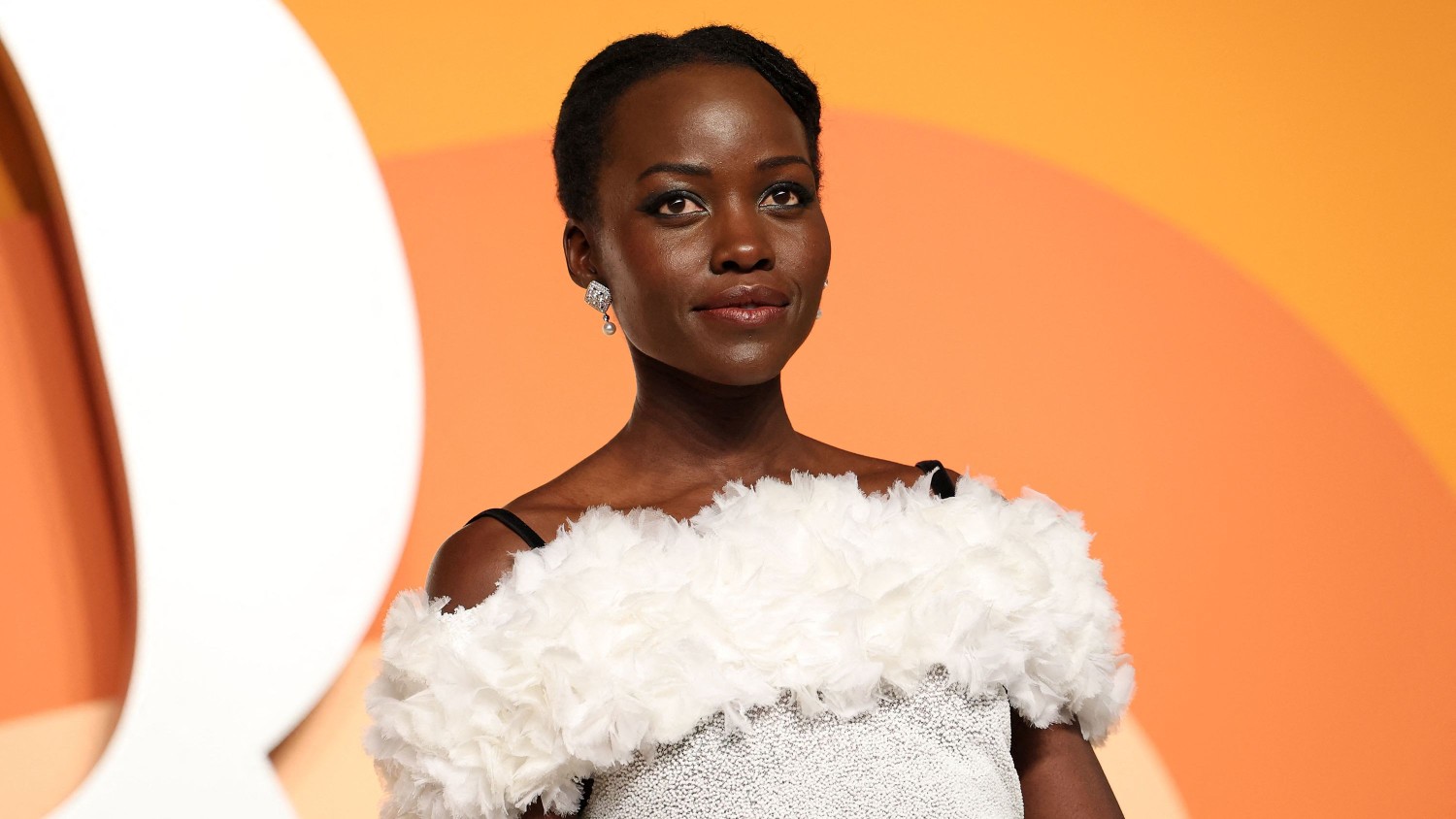 Actress Lupita Nyong'o at the 2025 Vanity Fair Oscar Party in Beverly Hills.  Michael Tran/AFP/Getty Images