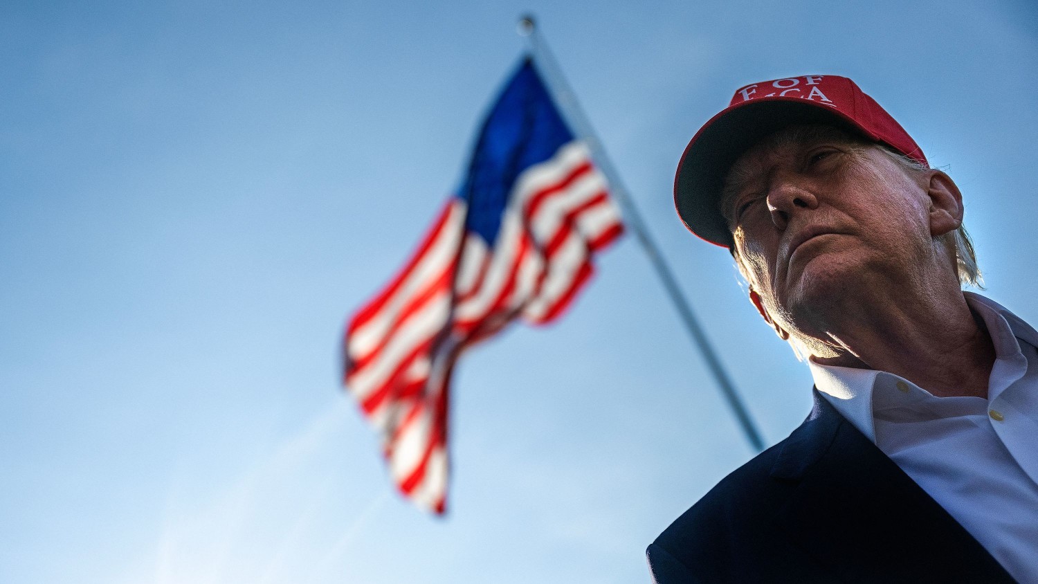 US President Donald Trump talks to members of the press as he departs from the South Lawn of the White House in Washington, DC, on July 1, 2025.  Jim Watson/AFP/Getty Images