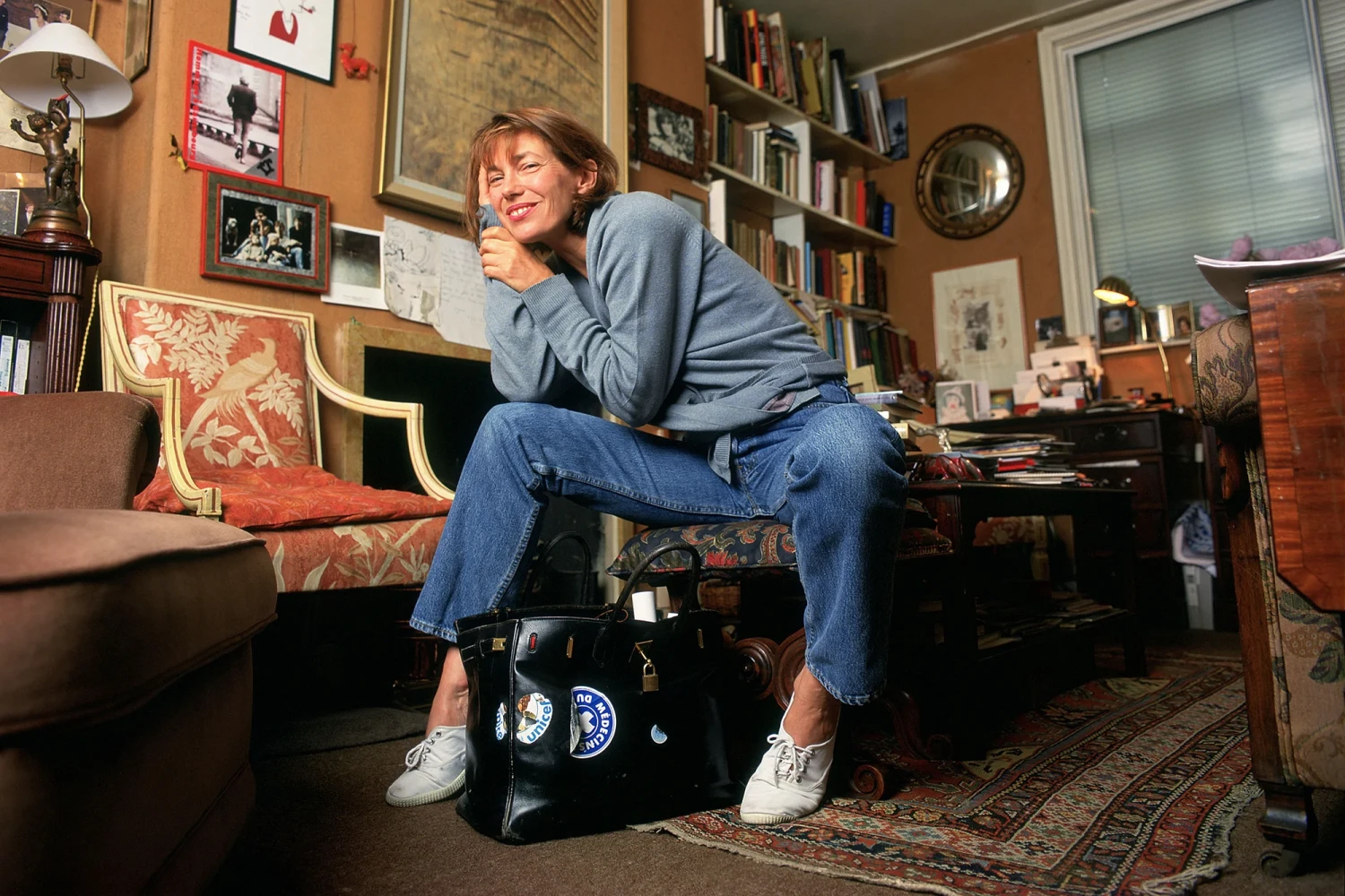 Jane Birkin with her original namesake bag. Sotheby's sold the luxury icon on Thursday. Mike Daines/Shutterstock