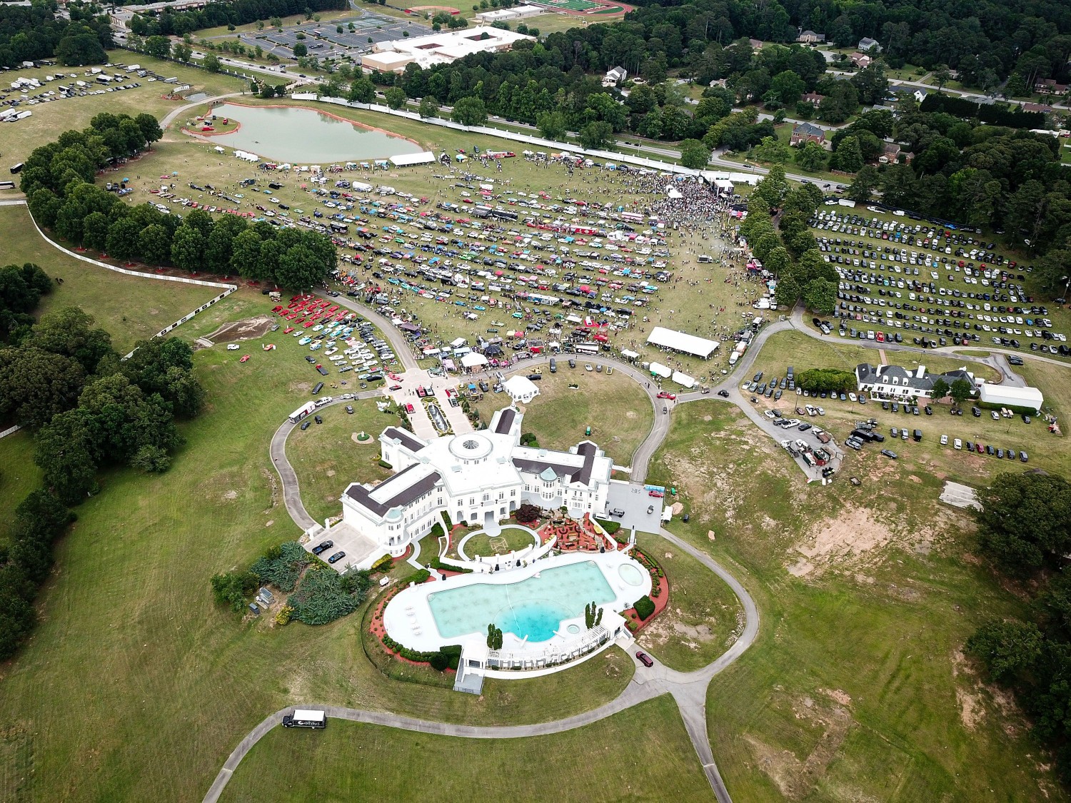 Rick Ross has one of the largest pools in the country. Life is going swimmingly for the hip-hop legend