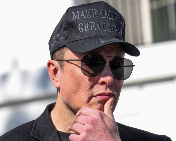 Elon Musk wears a Maga hat before his political relationship with Donald Trump turned toxic. Photograph: Kevin Lamarque/Reuters