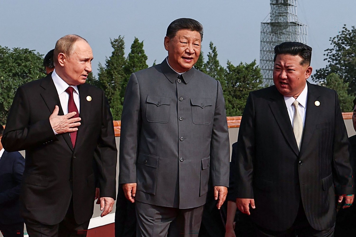 Xi, Putin and Kim stand united at Beijing military parade in historic show of authoritarian strength