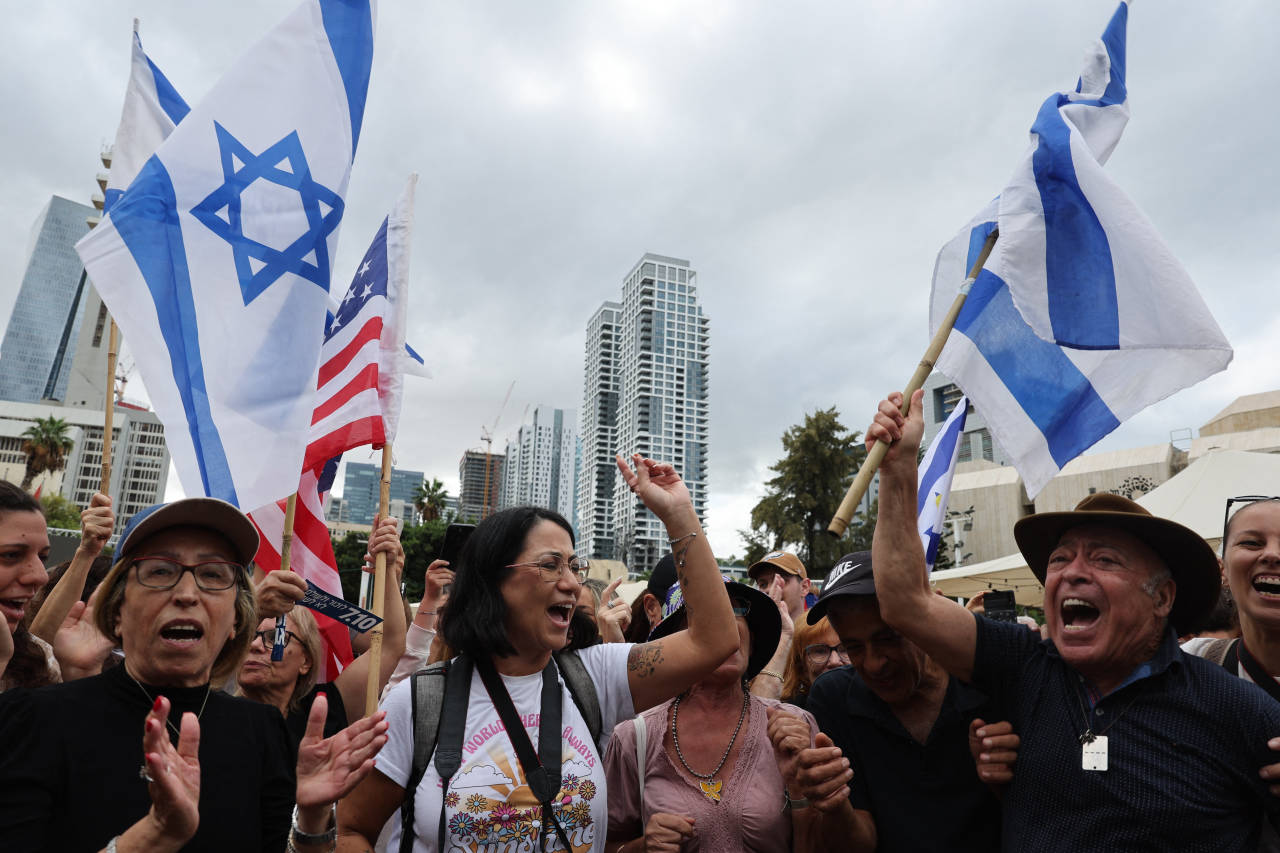 A celebration in Tel Aviv following the announcement of a deal. Photo: jack guez/AFP/Getty Images