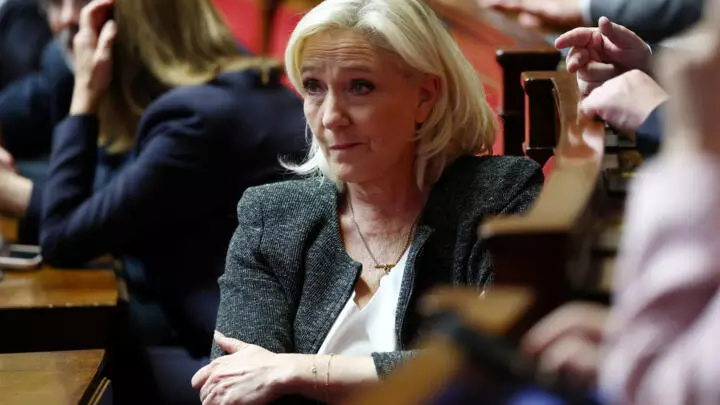 Marine Le Pen à l'Assemblée nationale avant le premier discours de politique générale le 14 octobre 2025. © Gonzalo Fuentes, Reuters