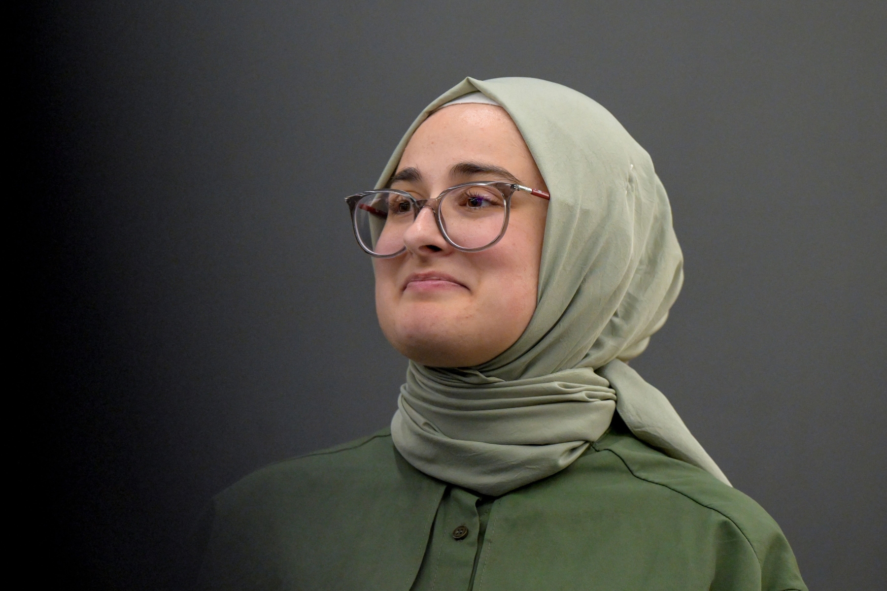Tufts University student Rümeysa Öztürk arrives at a news conference at Boston Logan International Airport on May 10, 2025, after spending over six weeks in an immigration detention center in Louisiana.  Faith Ninivaggi/Reuters