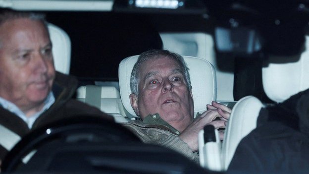 Former Prince Andrew pictured leaving police station after arrest