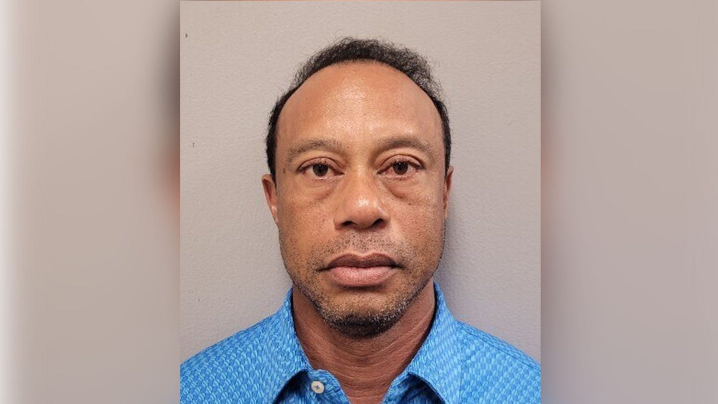 Tiger Woods released from jail after DUI arrest; eyes appear bloodshot in booking photo
