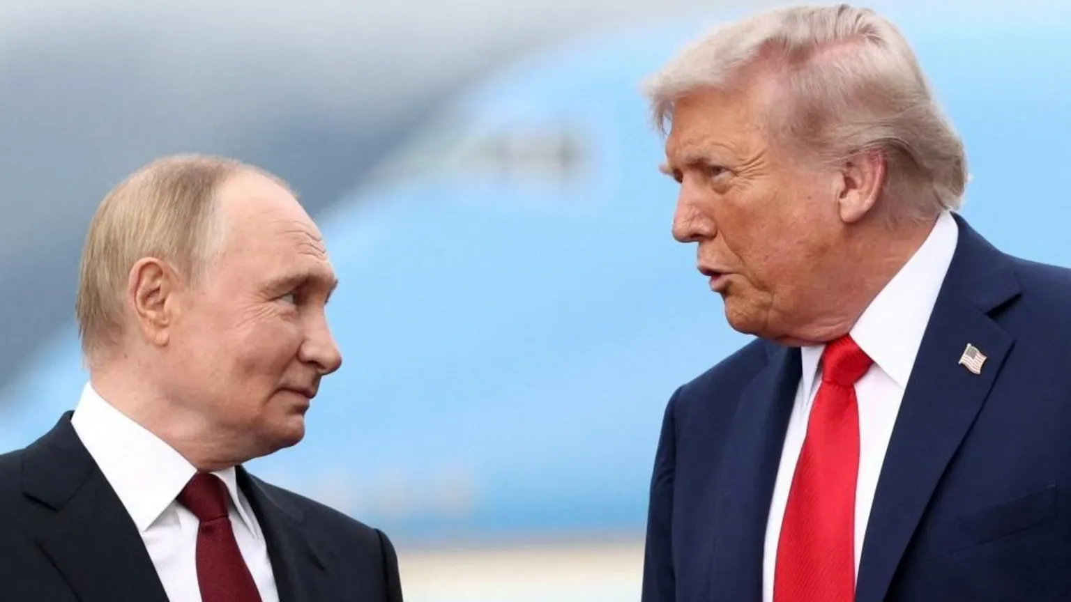 Trump and Putin speaking during a visit to Alaska Trump waives several Russia sanctions as row with Zelensky intensifies