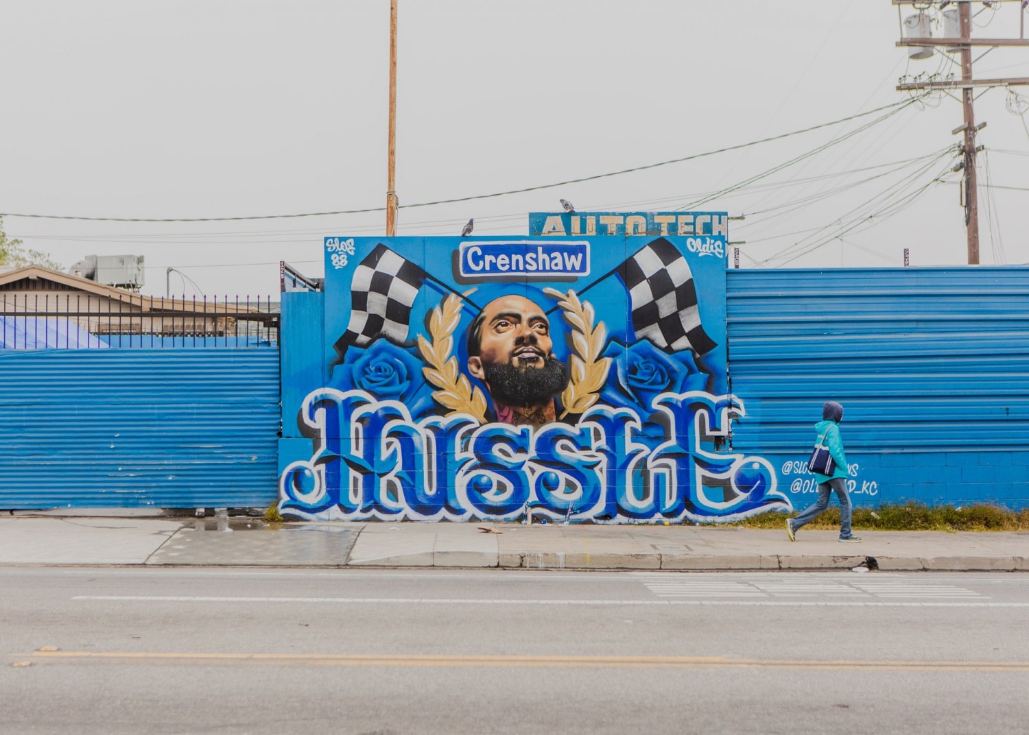  A Nipsey Hussle mural across from the Marathon Clothing store. Photograph: Alex Welsh/The Guardian